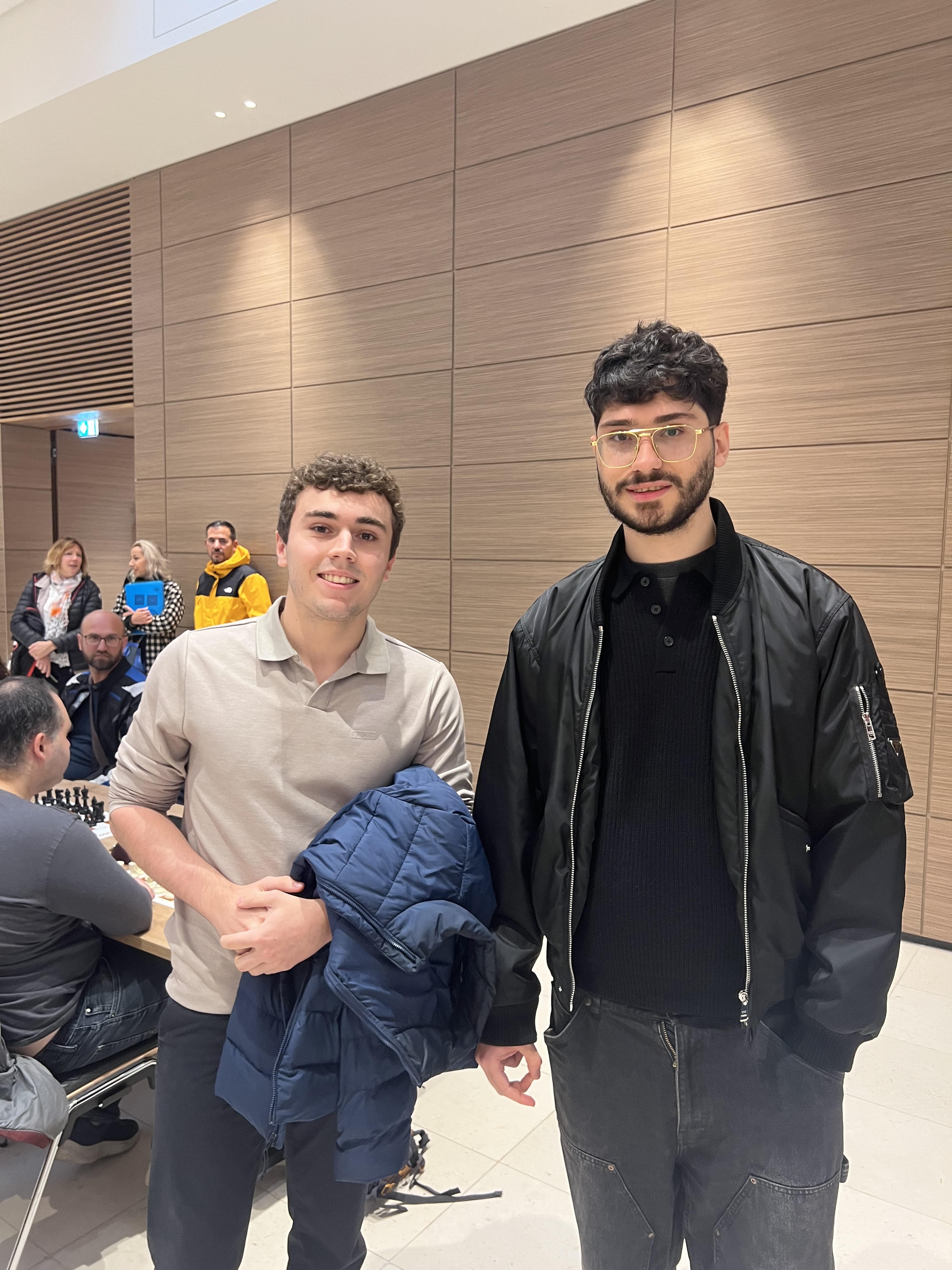 Me with chess player Alireza Firouzja in Chartres